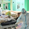 Bệnh nhân Covid-19 nặng ở Hà Nội cần đến bệnh viện nào, những ai được điều trị tại nhà?