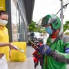 Grab hỗ trợ chi phí xét nghiệm Covid-19 cho đối tác tài xế tại TP.HCM