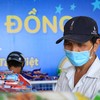 Người Sài Gòn cầm ‘tấm vé nghĩa tình’ mua thực phẩm miễn phí: Dịch này không lo đói