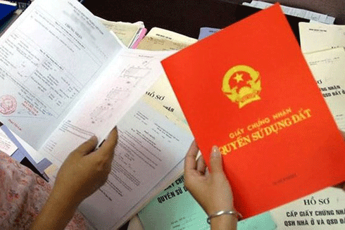 Các cặp vợ chồng mua đất chung phải cùng đứng tên "sổ đỏ" ảnh 1