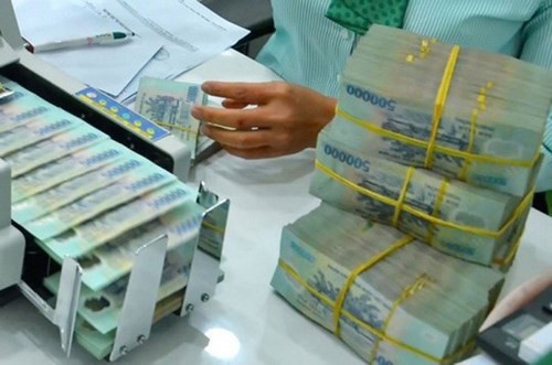Doanh nghiệp chịu ảnh hưởng của dịch virus corona có thể được ngân hàng miễn giảm lãi vay ảnh 1