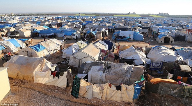 Cuộc sống ngập ngụa trong bùn của người tị nạn Syria ảnh 10
