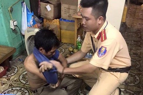 Chủ tịch nước Trần Đại Quang gửi thư khen 4 cán bộ chiến sĩ Công an giúp dân trong bão số 3 ảnh 2