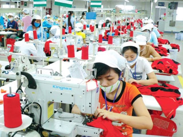 Giới sử dụng lao động không muốn tăng lương tối thiểu trong năm 2015 ảnh 1