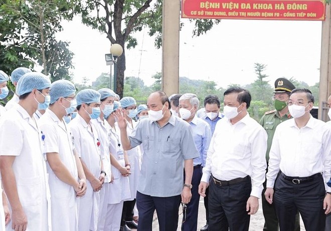 Chủ tịch nước Nguyễn Xuân Phúc: "Không được để Thủ đô- trái tim của cả nước bị dịch bệnh đe dọa" ảnh 1