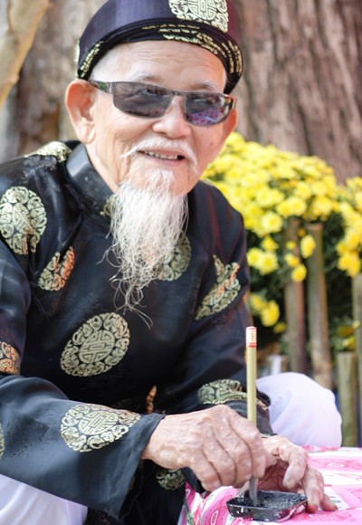 Xuân về, ông đồ xuống phố ảnh 14