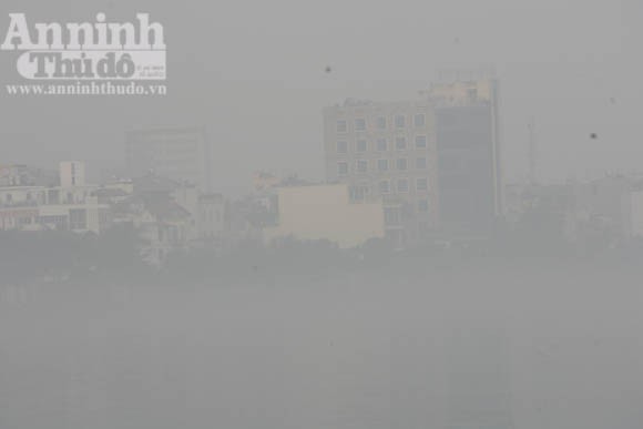 Sương mù dày đặc phủ kín Hà Nội ảnh 17
