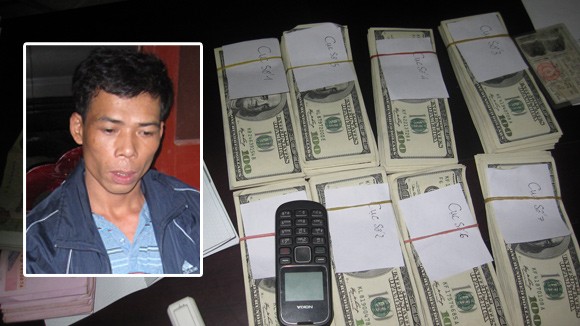 Mang trái phép 80.000 USD qua biên giới ảnh 1