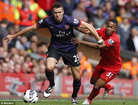 Podolski và Cazorla tỏa sáng, Arsenal hạ Liverpool ảnh 1
