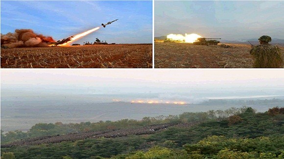 Ông Kim Jong-un thị sát diễn tập bắn đạn thật cực lớn của quân đội Triều Tiên ảnh 5