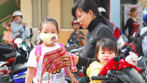 Méo mặt trông con nghỉ Tết ảnh 1