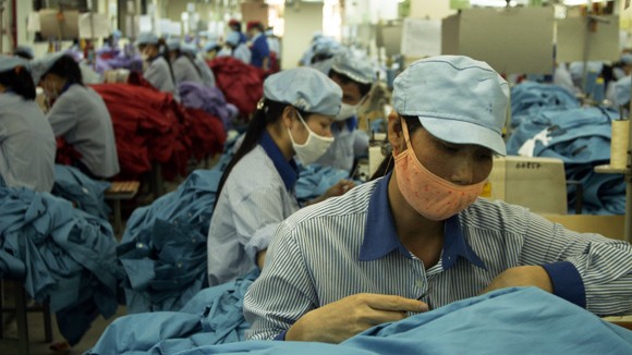 Cân nhắc tăng lương tối thiểu trong năm 2015 ảnh 1