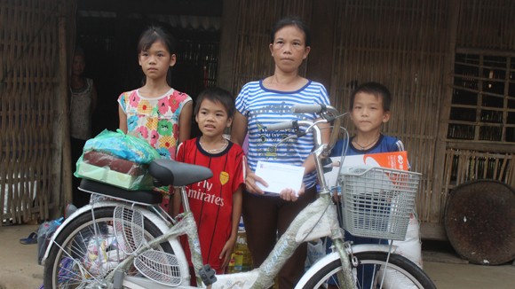 Nuôi chồng bị liệt và 3 con ăn học ảnh 1
