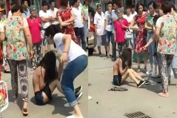 Nhóm phụ nữ Trung Quốc hung hãn đánh ghen dã man cô gái trẻ giữa phố ảnh 1