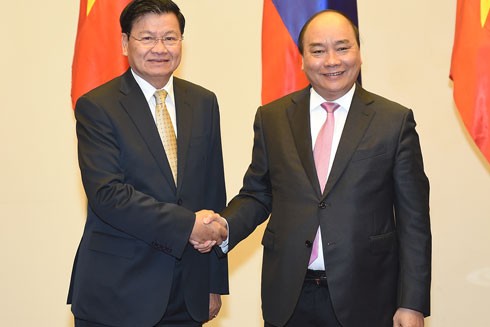 Thủ tướng Lào "xông đất Việt Nam" và họp Ủy ban liên Chính phủ hai nước ảnh 1