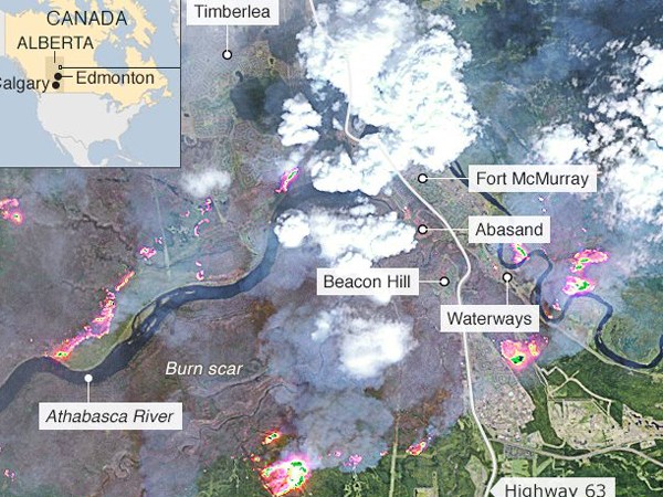 Cháy rừng khủng khiếp ở Canada đe dọa cuộc sống hơn 80.000 dân ảnh 6