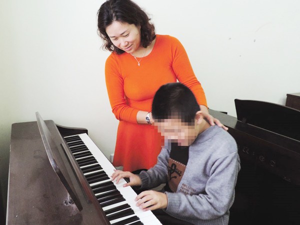 Nghệ sỹ viola Nguyệt Thu: Dùng âm nhạc giúp trẻ tự kỷ hòa nhập cộng đồng ảnh 1