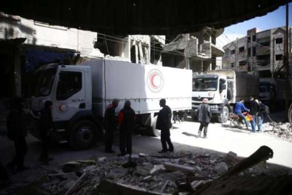 Hàng cứu trợ bị chuyển tới kho của phiến quân tại đông Ghouta ảnh 1