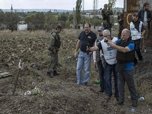Chấn động: Nội tạng một số nạn nhân trong mộ tập thể ở Donetsk biến mất ảnh 1