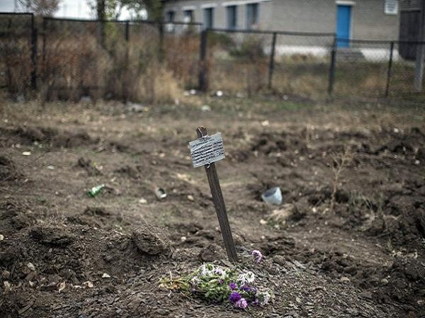Chấn động: Nội tạng một số nạn nhân trong mộ tập thể ở Donetsk biến mất ảnh 2
