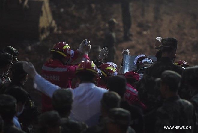 Vụ lở đất ở Trung Quốc: Sống sót "thần kỳ" sau 3 ngày bị vùi lấp trong đống đổ nát ảnh 6