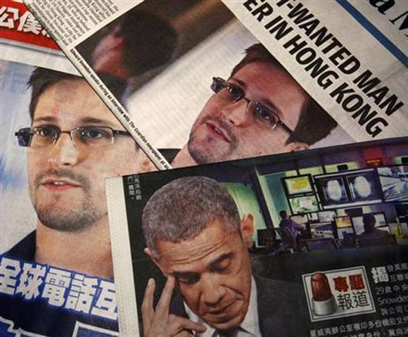 Vụ Edward Snowden: Nhà trắng mập mờ thông tin Obama tới Moscow ảnh 1