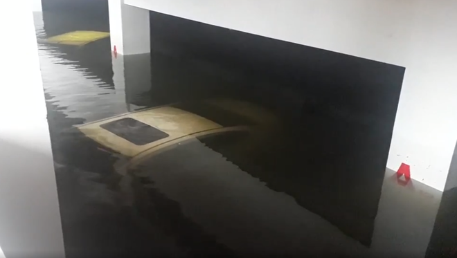 Hầm chung cư ngập nước gây hỏng xe, ai chịu trách nhiệm bồi thường? ảnh 1