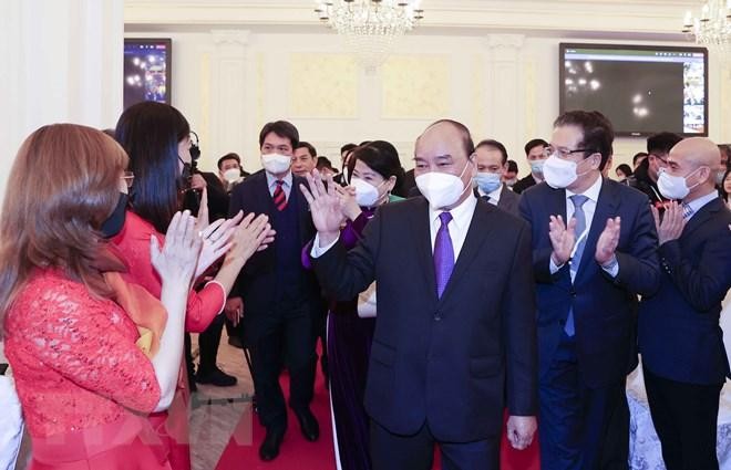 Chủ tịch nước Nguyễn Xuân Phúc gặp mặt đại diện kiều bào Việt Nam tại Nga ảnh 1