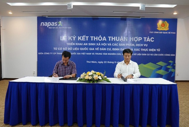 NAPAS và Bộ Công an ký kết thỏa thuận hợp tác ảnh 1