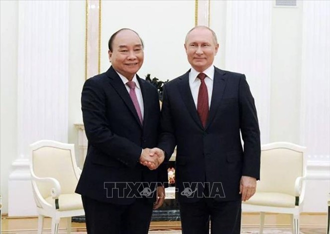 Chủ tịch nước Nguyễn Xuân Phúc hội đàm và dự chiêu đãi của Tổng thống Nga Vladimir Putin ảnh 1
